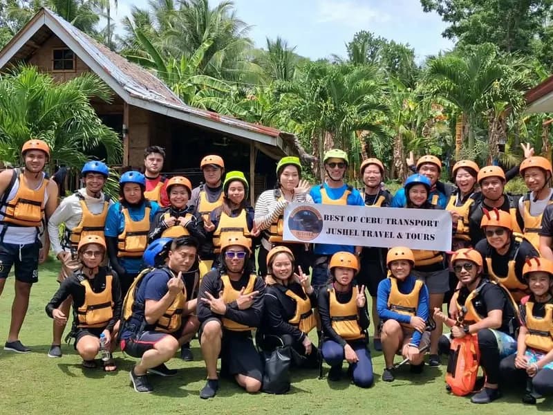Jushel guests in helmets and life vests before canyoneering in Badian